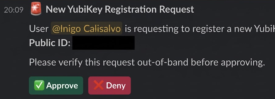 Admin channel message with Approve and Deny buttons for a new YubiKey registration
